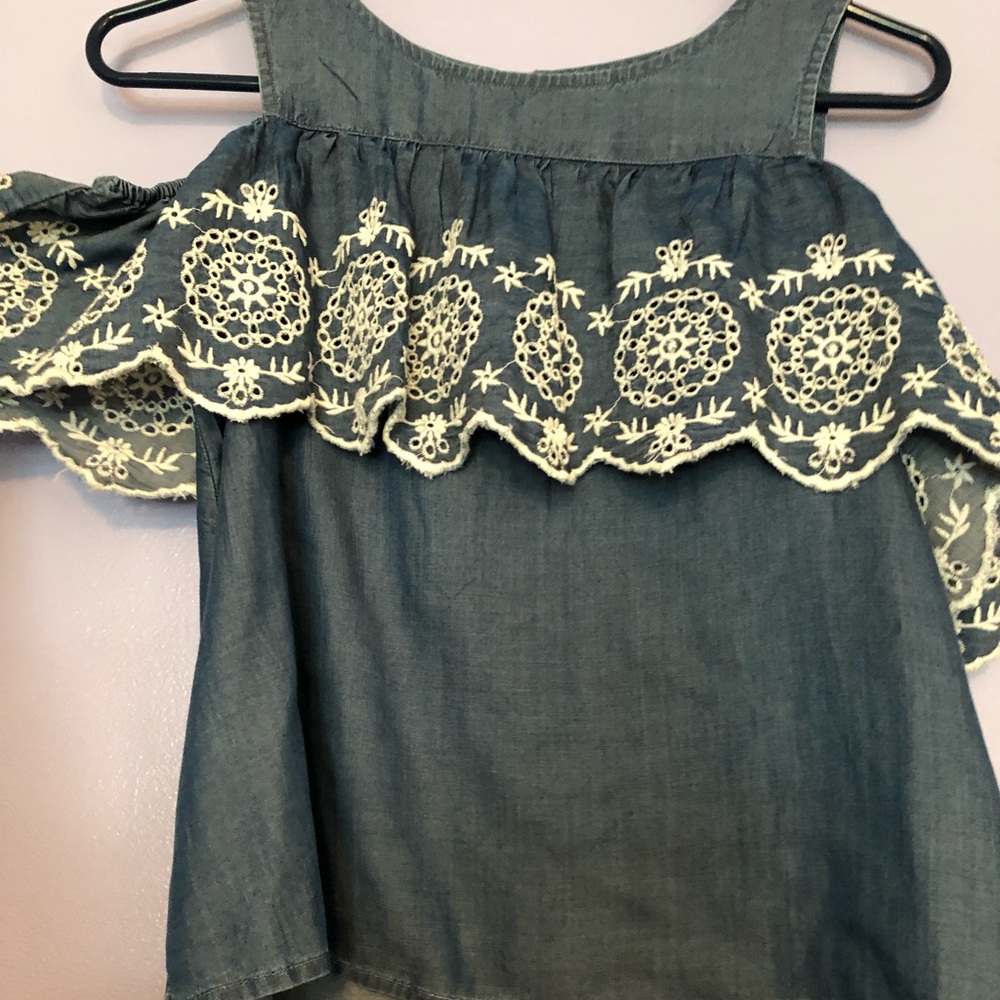 Cute jean material off the shoulder tee